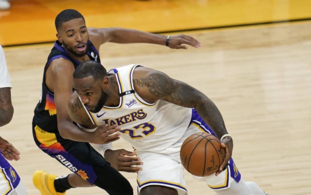  布克末节爆发太阳击退热火延续客场不败神话